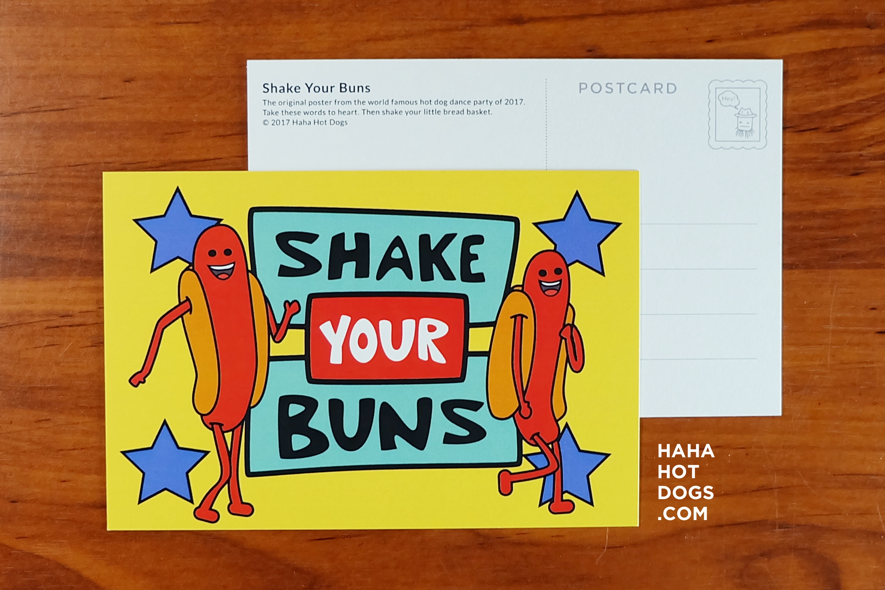hot dogs shaking their buns postcard